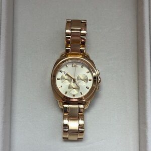 Coach gold watch